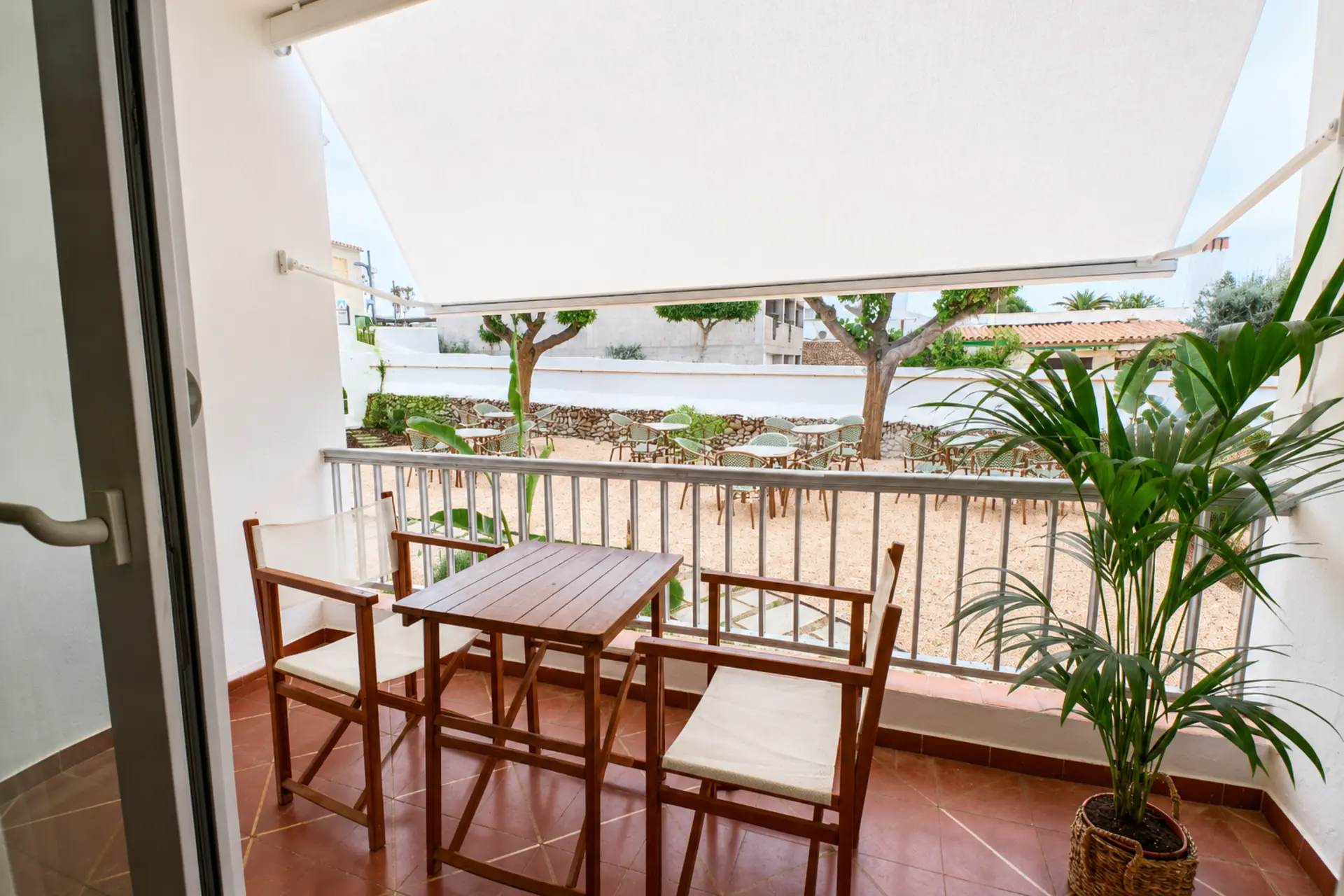 Terraza con vistas al puerto — Hotel S'Algaret